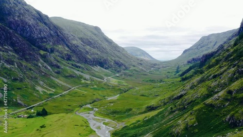Aerial Drone Shot of Road Through the Glen Coe Hills 04. High quality video footage photo