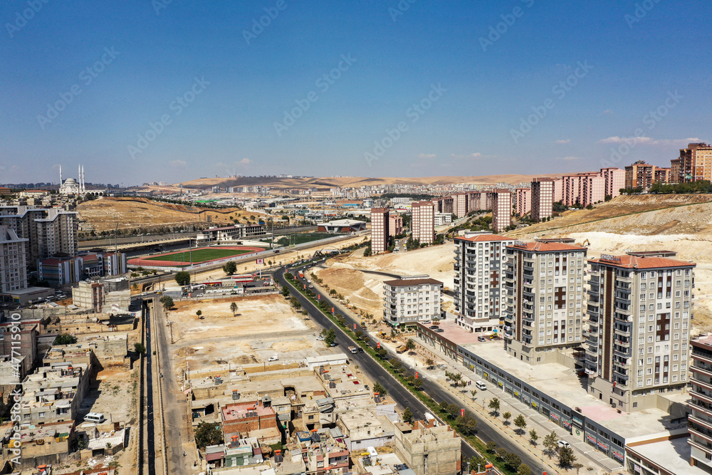View of the streets and the city from above with drone in daylight. Turkey Gaziantep.