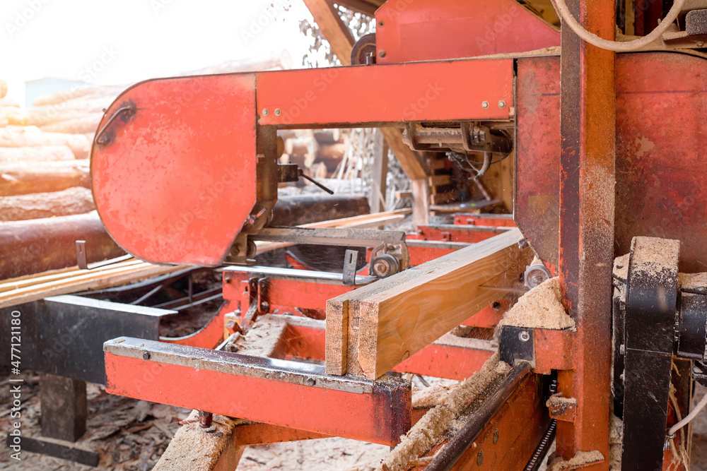 Sawmill. Sawing and processing of wood on the equipment of the sawmill Sawmill. Sawing and processing of wood on the equipment of the sawmill