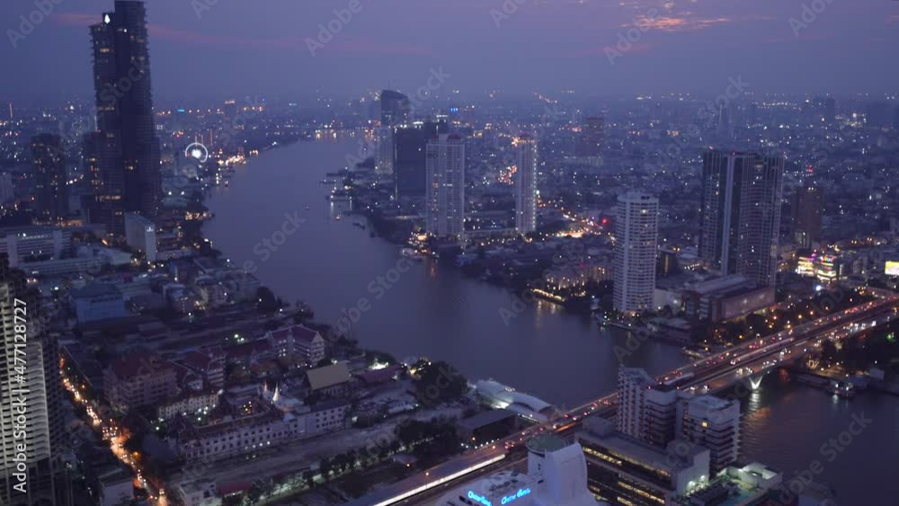Scenic View Of Bangkok Riverside In The Evening - aerial shot Scenic View Of Bangkok Riverside In The Evening - aerial shot