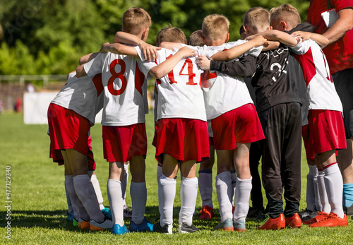 Children Team Sport. Kids Play Sports. Children Sports Team United Ready to Play Game. Football Coach With School Boys. Youth Sports For Children. Boys in Sports White and Red Uniforms
