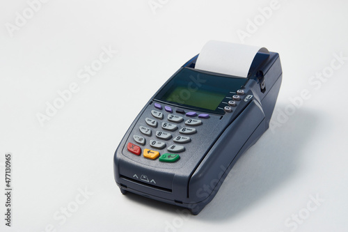 Payment terminal on white background with copy space