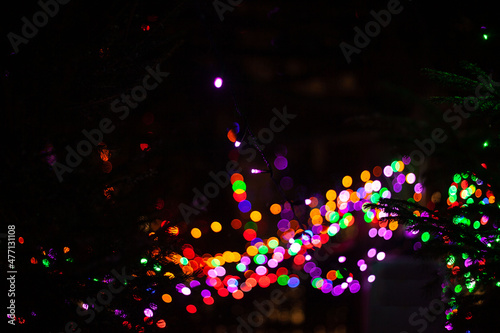 lots of multi-colored blurred lights from garlands