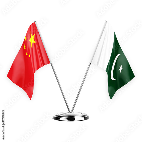 Canvas Print Two table flags isolated on white background 3d illustration, china and pakistan