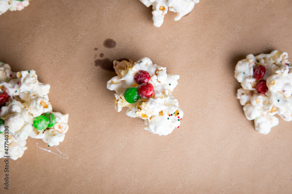 Red and green popcorn balls with chocolate and marshmallows Red and green popcorn balls with chocolate and marshmallows