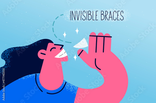 Smiling woman with invisible braces system