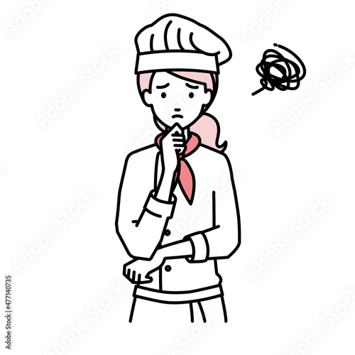 立って手をあごにあてて困っている調理師の女性