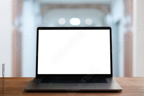 laptop with blank screen,cafe background for light bokeh. 