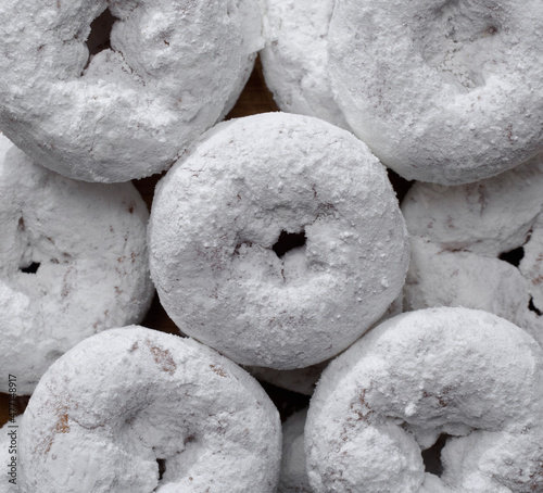 Overhead view of powdered donuts or doughnuts