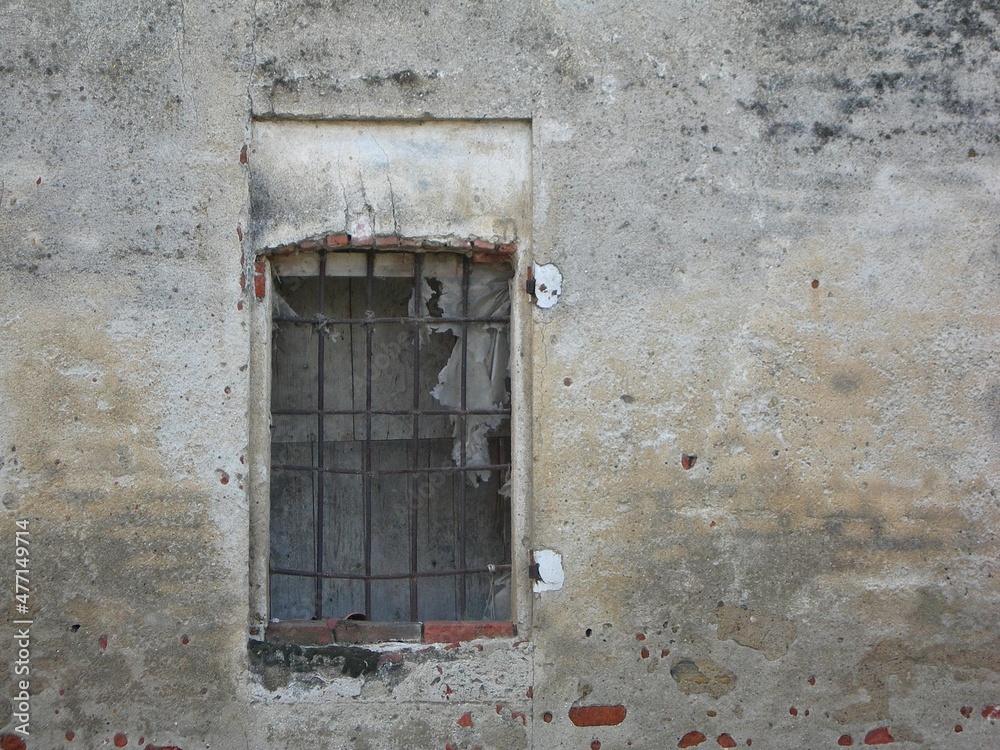 Italy: Ruined window of the ancient house.