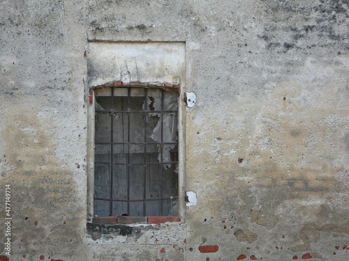 Italy: Ruined window of the ancient house.