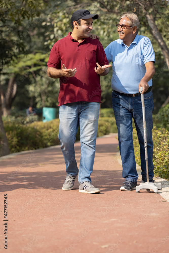 custom made wallpaper toronto digitalCheerful grandfather spending leisure time with son at park
