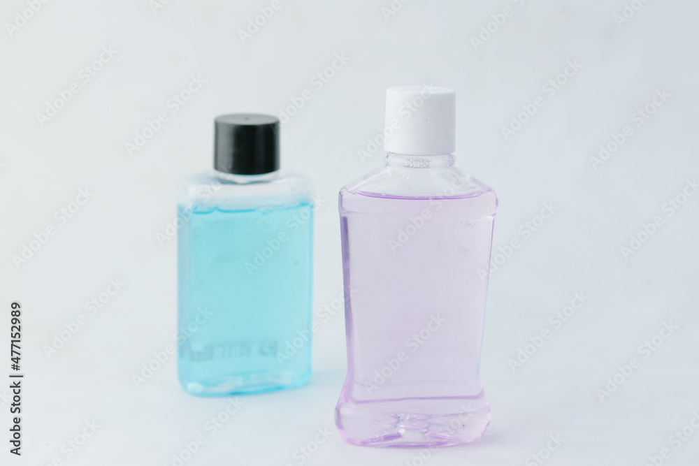mouthwash liquid in a container on table 