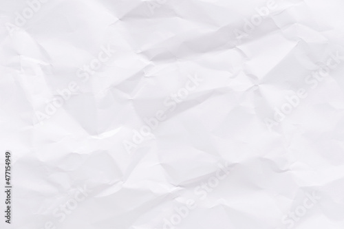 White crumpled paper texture background.