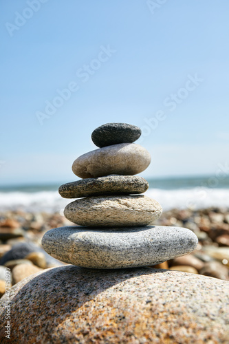 USA, New York, Montauk, Stacks pf pebbles on beach photo