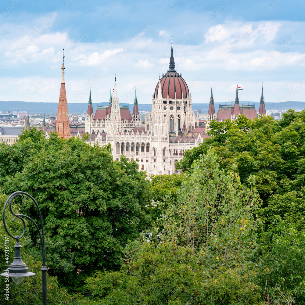 Hungarian Parliament in Budapest, unusual view from above with green trees of public park