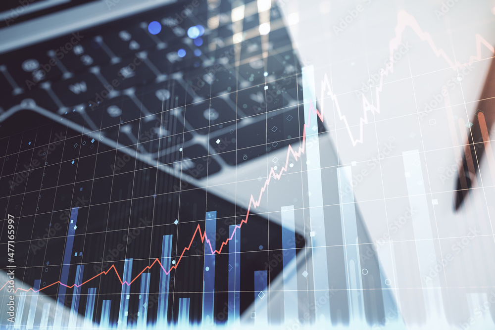 Double exposure of abstract creative financial diagram on modern laptop background, banking and accounting concept Double exposure of abstract creative financial diagram on modern laptop background, banking and accounting concept