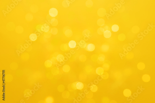 beautiful yellow festive background, blurry lights