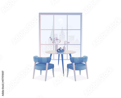 This bright, simple dining room is given a fresh and clean look with its blue color scheme. The night city outside the window adds a romantic mood. © Kate Krasun