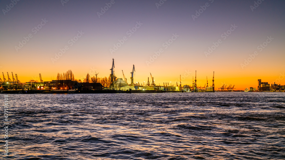 Hamburg, Germany. The harbor at sundown.