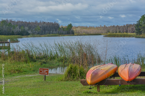 Kayaks at the boat launch on Mac Lake, Colt Creek State Park, Lakeland, Polk County, Florida photo