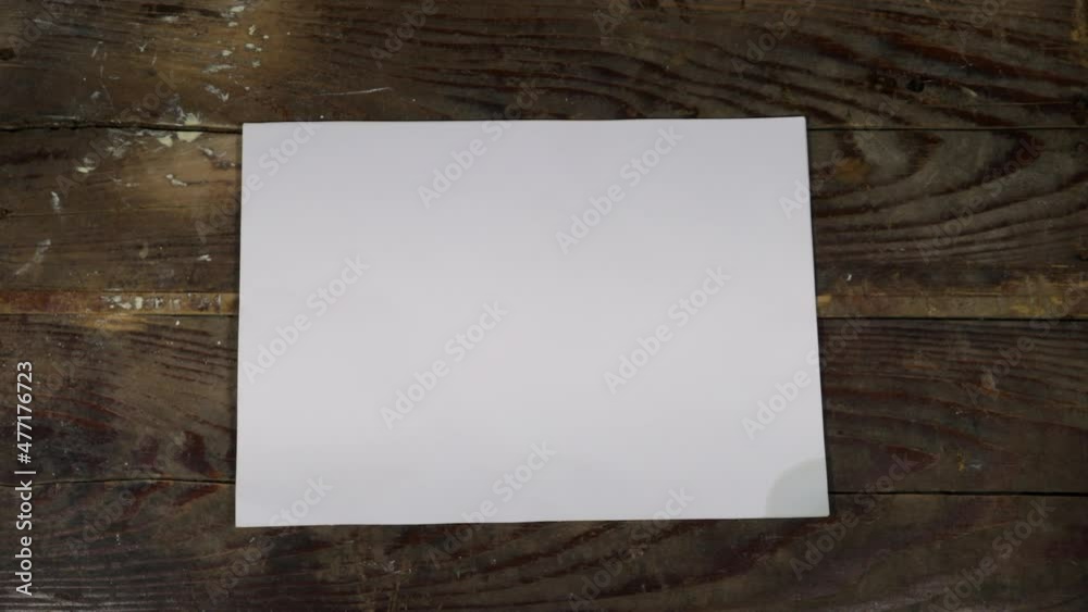 woman put blank papers, billboard on wood table for your design or your text woman put blank papers, billboard on wood table for your design or your text