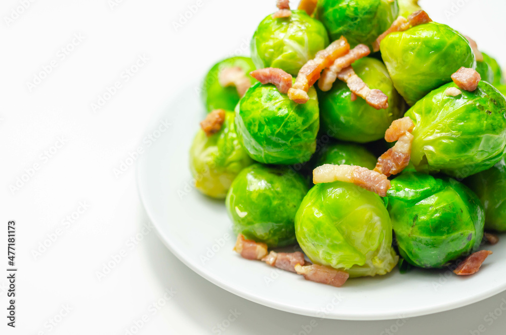 Tasty brussels sprouts with smoked bacon lardons and salted butter Tasty brussels sprouts with smoked bacon lardons and salted butter