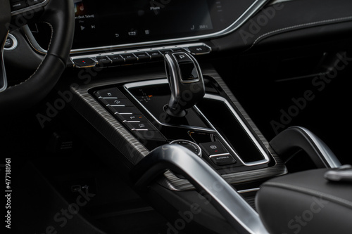Modern automatic gearbox. Close up of the gearbox transmission handle. Automatic gear stick. © Roman
