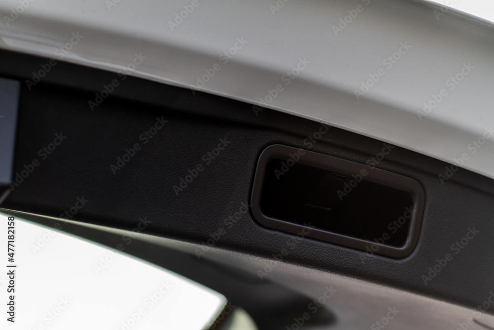 Trunk door handle. Modern car trunk door opened. Trunk door handle. Modern car trunk door opened.