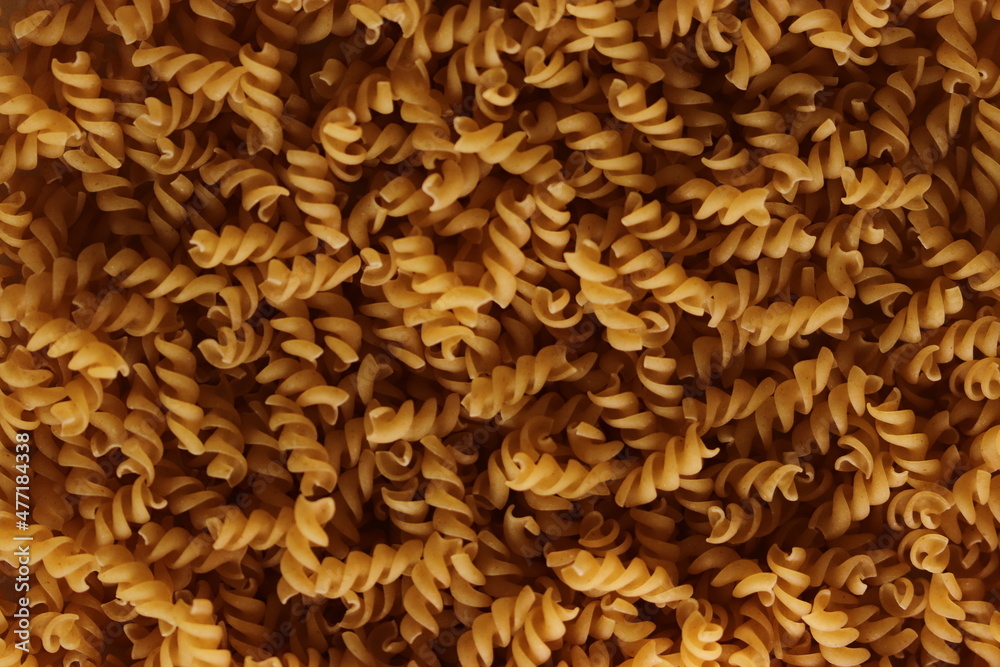 background of spread fusilli pasta background of spread fusilli pasta