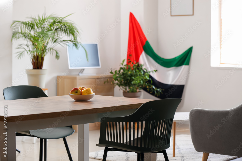 Stylish room with UAE flag and dinning table