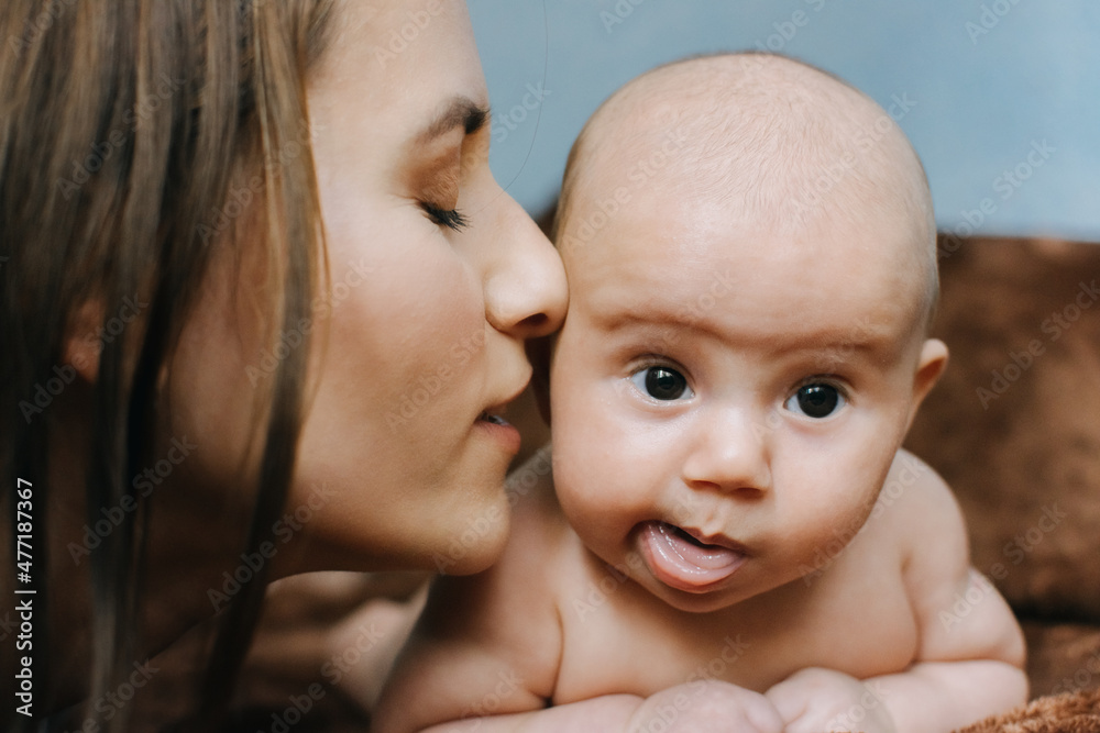 Mental Health in Postpartum Time. Maternal Mental Health. How to avoid pregnancy And Postpartum Disorders, postpartum baby blues, depression. Portrait of happy mother and newborn baby Mental Health in Postpartum Time. Maternal Mental Health. How to avoid pregnancy And Postpartum Disorders, postpartum baby blues, depression. Portrait of happy mother and newborn baby