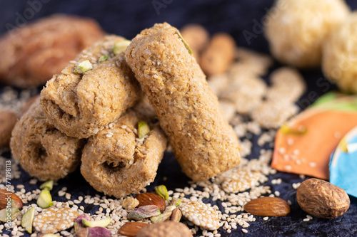Winter delicacy Indian traditional sweet mithai with kites for Makar Sankranti Lohri Gajak Also Known As Gur Gajjak Gazak Gachak Made Of Jaggery Gud Almonds Badam And Pistachio