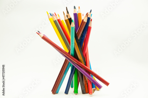 colored pencils on a white background. education concept. illustration of training.