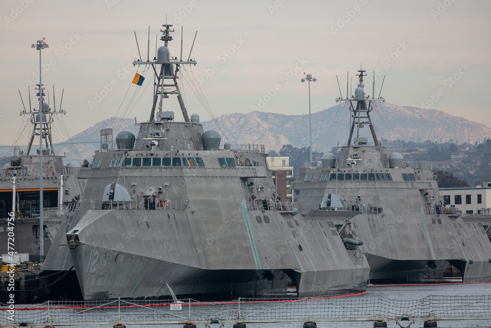 A Pair of Stealth Technology Missile Frigates Docked at the San Diego Naval Yard with Energy Reflective Design Superstructure A Pair of Stealth Technology Missile Frigates Docked at the San Diego Naval Yard with Energy Reflective Design Superstructure