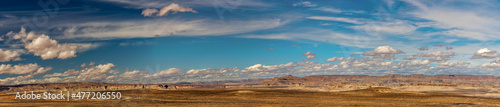 Panoramic range of hills as far as the eyes can see on the desert under th blue sky, Wahweap lookout, Page, AZ