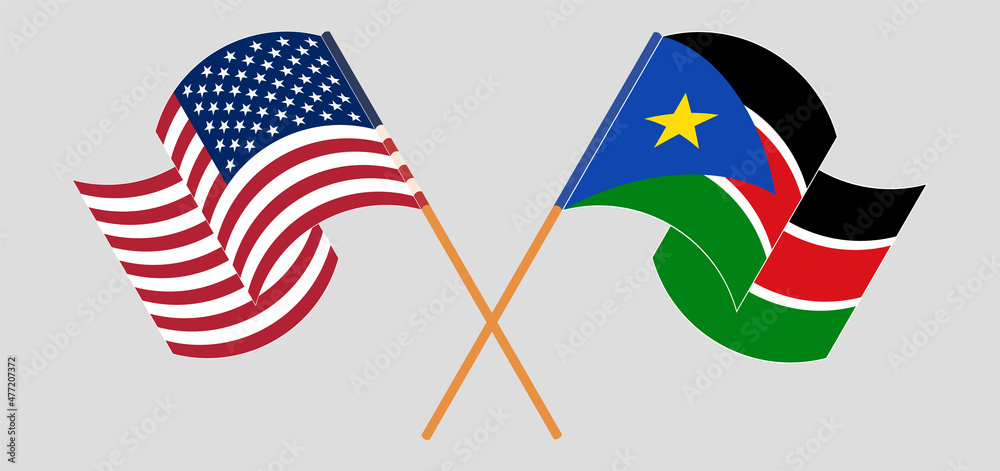 Crossed and waving flags of the USA and South Sudan Crossed and waving flags of the USA and South Sudan