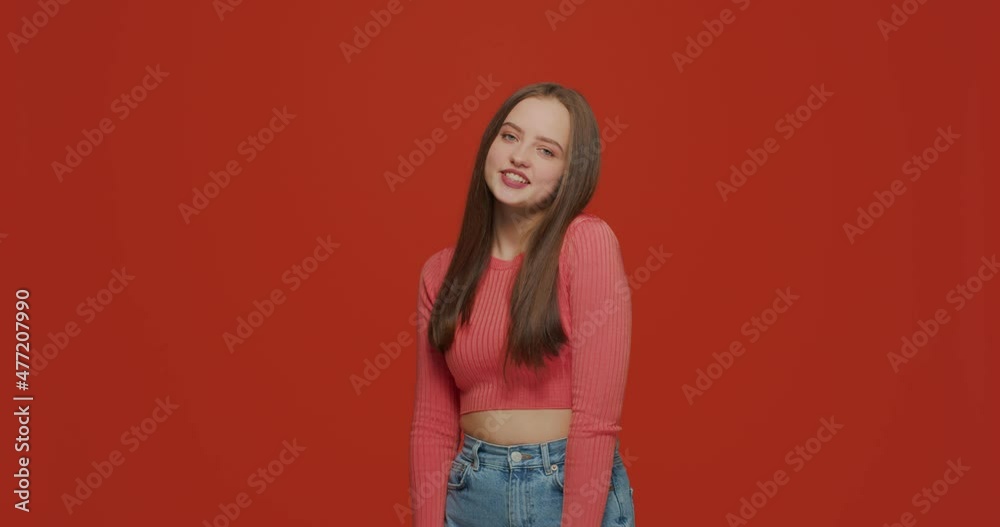 Modern polite friendly girl extending hand to camera, offering handshake greeting, welcoming. Acquaintance, good manners Modern polite friendly girl extending hand to camera, offering handshake greeting, welcoming. Acquaintance, good manners