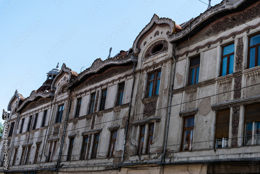 Aged building and damaged on Independentei street. Oradea, Romania.