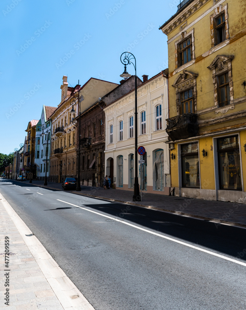 Iosif Vulcan street with old buildings. Oradea, Romania.