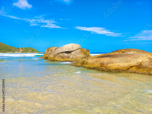 rocky coast in tropical beach at Atalaia Mariscal Bombinhas Brazil