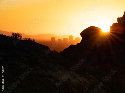 Sunrays and Phoenix Cityscape from Camelback Mountain in Arizona
