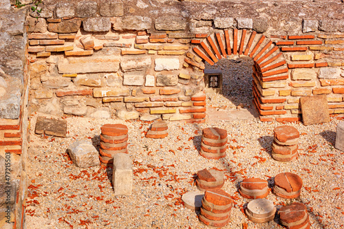 View of remains hypocaust, the heating system in the thermae ruins of the ancient Roman Odessos, in the city of Varna, on the Black Sea coast of Bulgaria photo