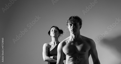 Romantic lovers. Couple in love. Man and woman posing studio. Couple. Beauty photo. 