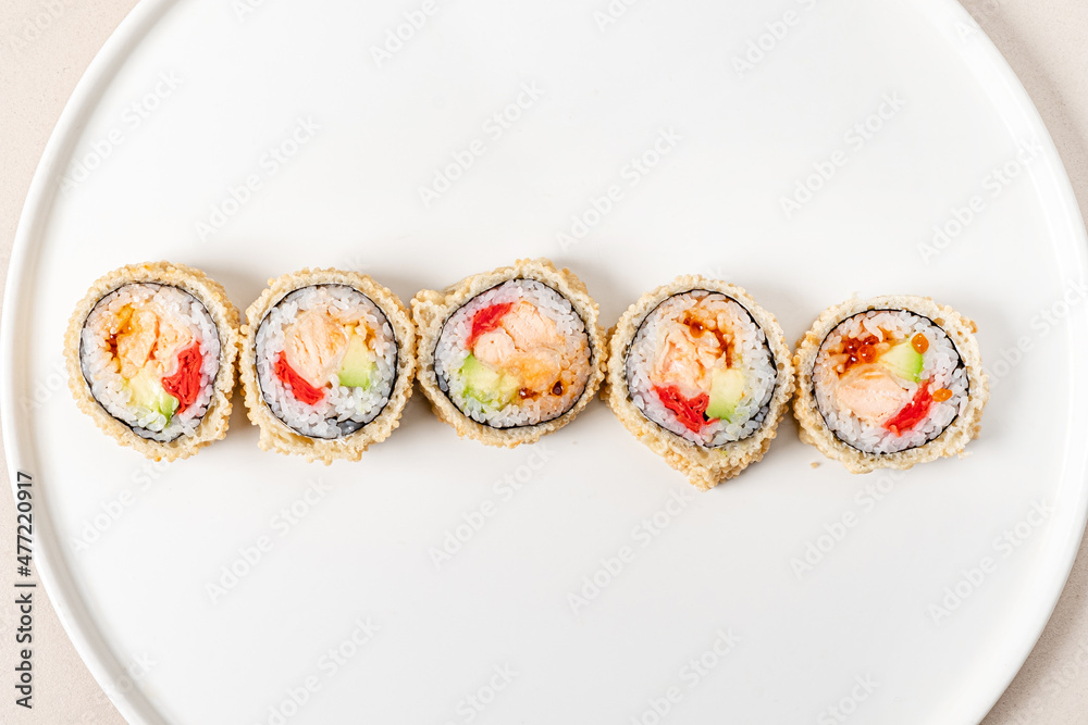 Teriyaki sushi roll isolated on white background. Teriyaki sushi roll isolated on white background.