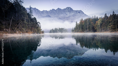 alps eibsee lake clouds blue mountains photo