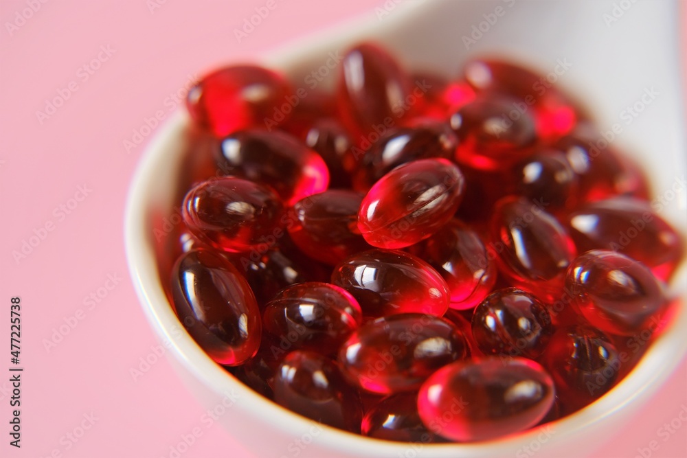 Krill oil. Red gelatin capsules with krill oil .omega fatty acids