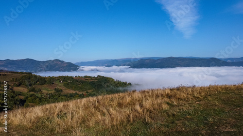 Mountain Landscape Covered In Clouds, Aerial View