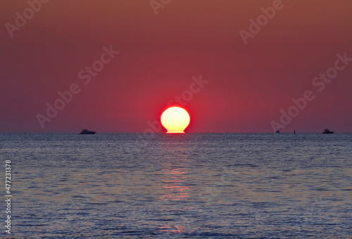 Fototapeta Naklejka Na Ścianę i Meble -  Ships in the Black Sea at sunset
