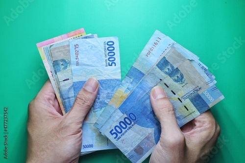 Rupiah the official currency of Indonesia. Business and finance concept. Uang 50000 Rupiah. Bank Indonesia. Copy space, Negative space.